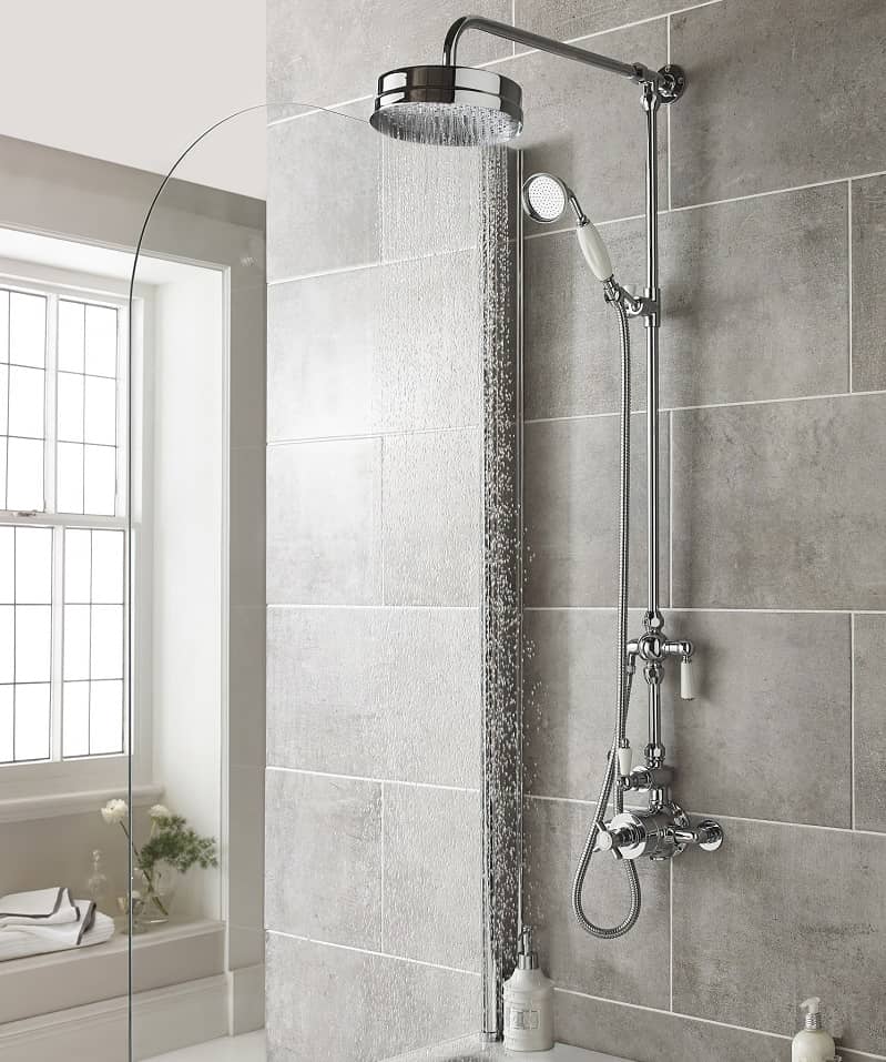 traditional shower with rain shower head and hand shower