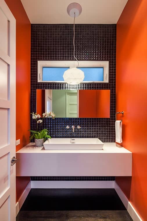 colourful cloakroom suite with red and black