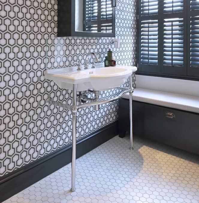 grey bathroom grey bathroom with traditional washstand and pattered walls