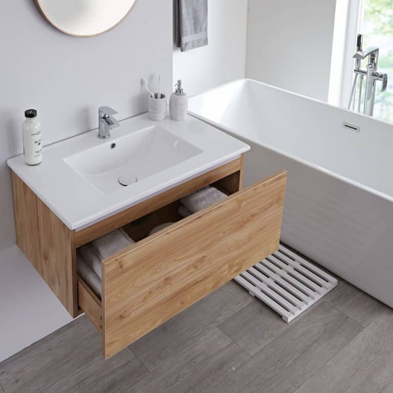 Wood effect wall hung vanity unit with mono tap.