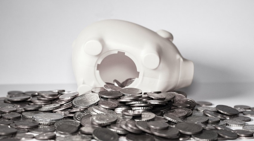 money-piggy-bank Open piggy bank with coins spilt out