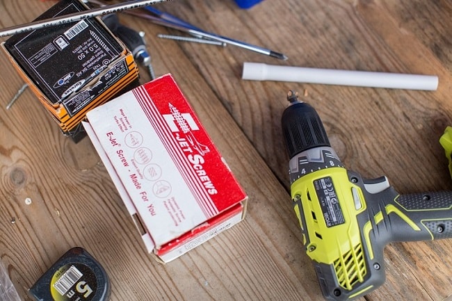 screws, electric drill, and tools