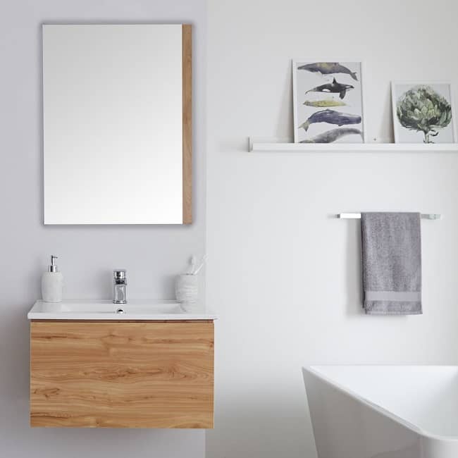 rectangular bathroom mirror with wall mounted vanity unit with wooden accents