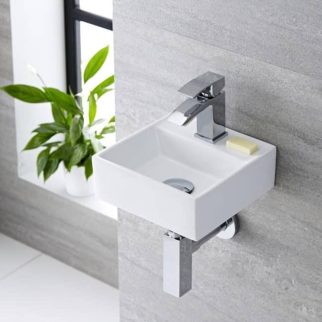 wall hung cloakroom basin with chrome basin tap