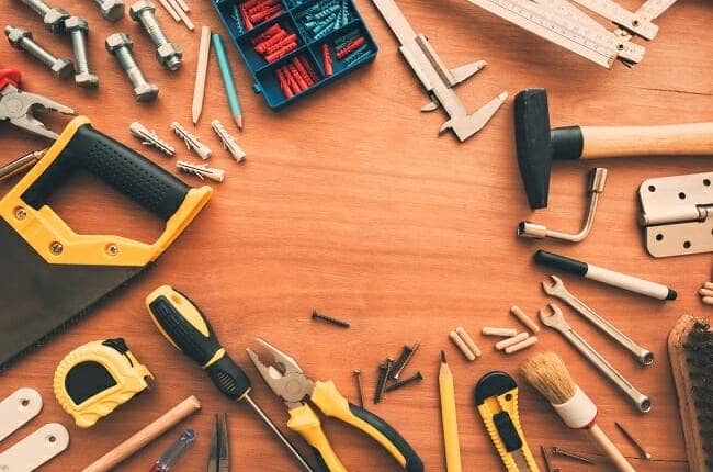 Hobby handyman tools top view on workshop desk