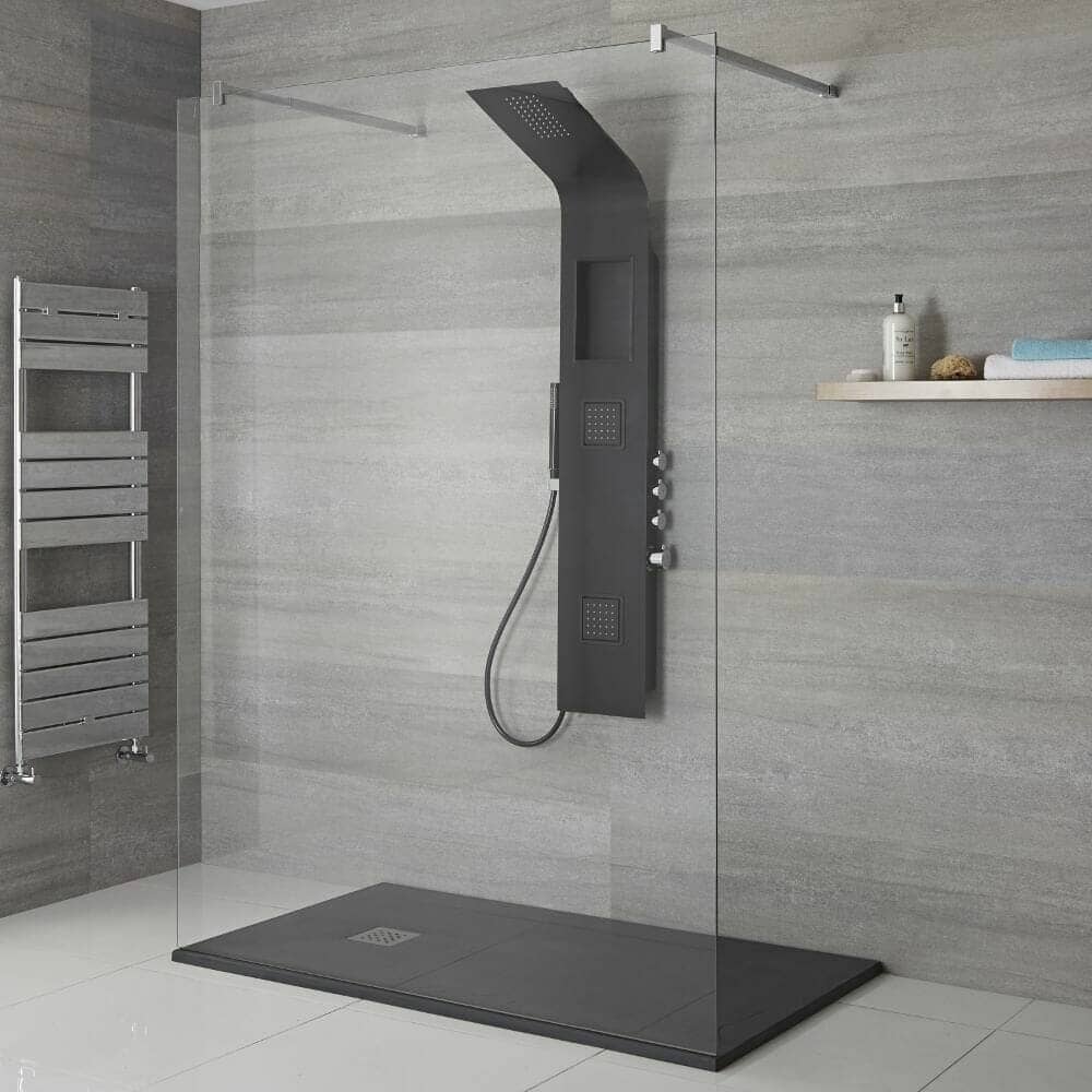 a black milano power shower in a walk in shower space