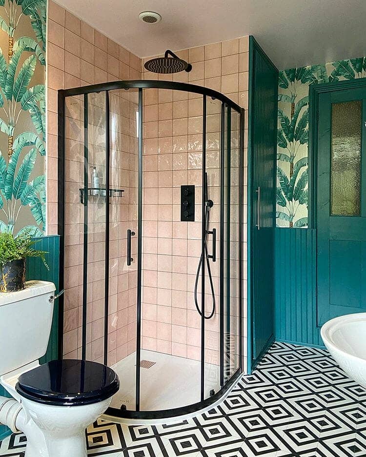 Black modern corner shower enclosure in updated bathroom