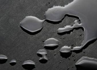 Water splash on black flooring