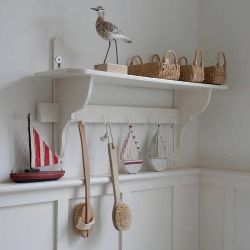Bathroom shelf with hooks to save space