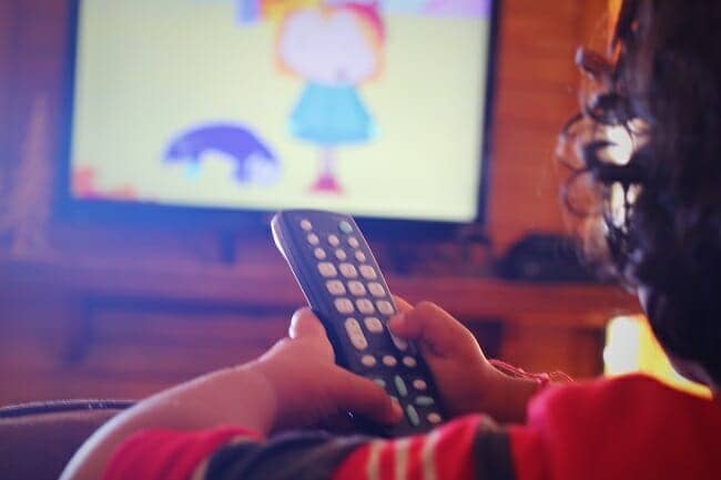 a toddler watching tv before bedtime