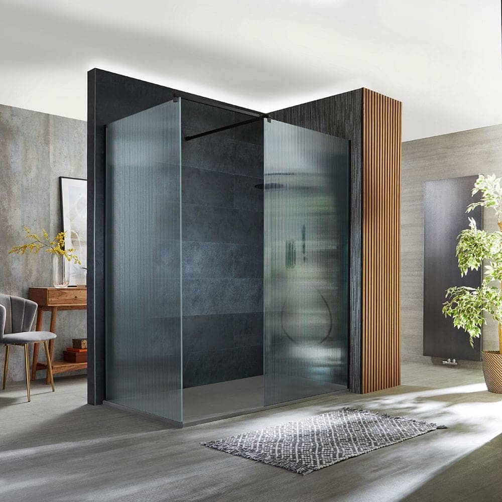 a fluted glass shower enclosure in a modern bathroom space