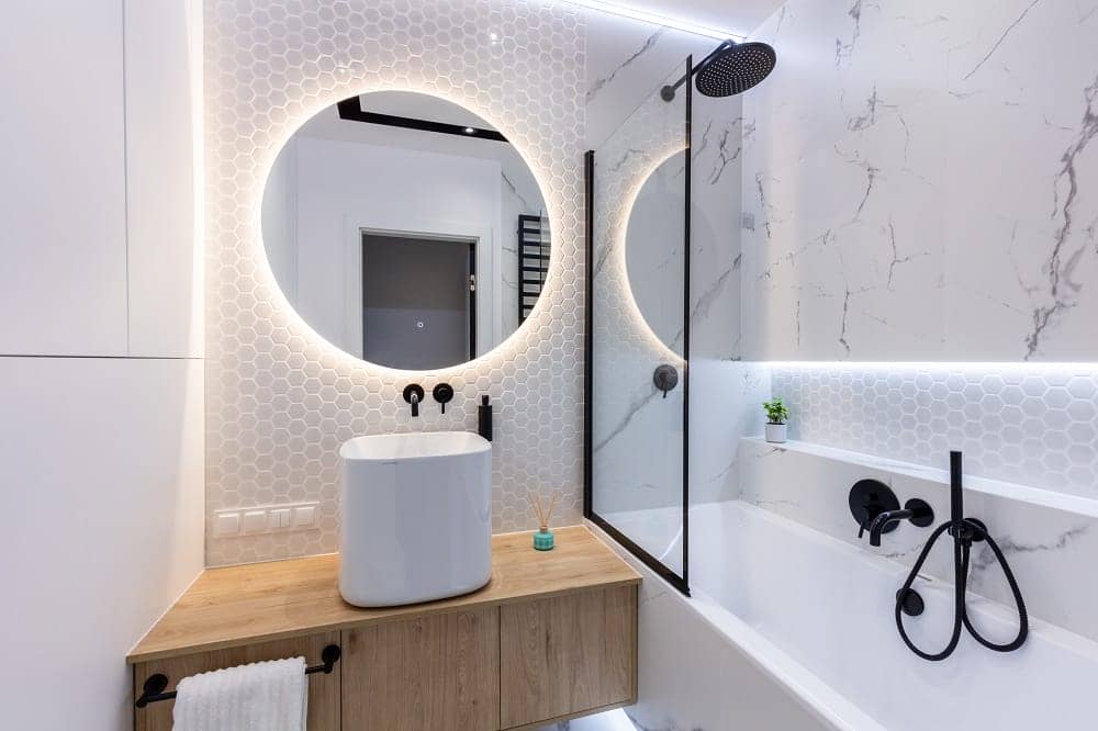 a modern bathroom with amazing lighting